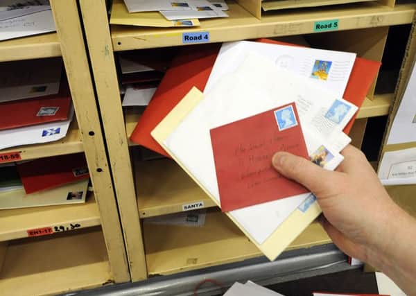 A drop in letter volumes offset a stronger performance from Royal Mail's parcels business. Picture: Julie Bull