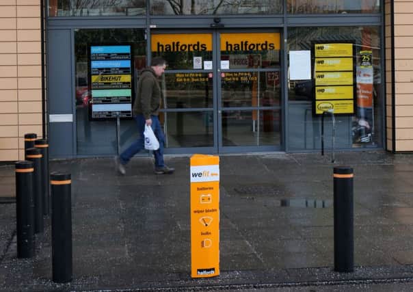 Halfords has bought a minority stake in a mobile tyre-fitting business. Picture: Chris Radburn/PA Wire