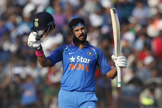 India's Yuvraj Singh celebrates scoring his 14th ODI century at the Barabati Stadium in Cuttack. Picture: Aijaz Rahi/AP