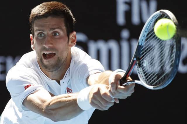 Novak Djokovic makes a backhand return during his shock defeat to Uzbekistan's Denis Istomin. Picutre: Kin Cheung/AP