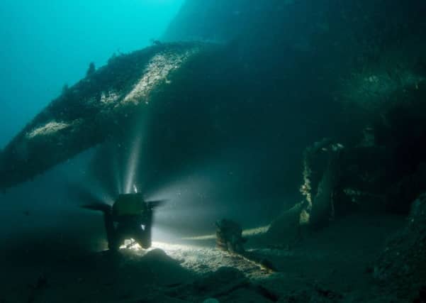 Divers survey the wreck of HMS Vanguard. Picture: Bob Anderson/HMS Vanguard Expedition 2017/PA Wire