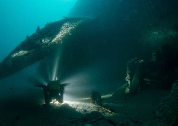Divers survey the wreck of HMS Vanguard. Picture: Bob Anderson/HMS Vanguard Expedition 2017/PA Wire