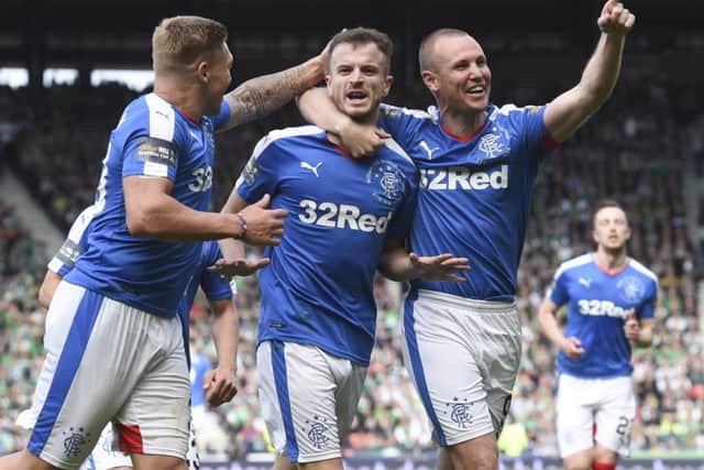 Andy Halliday, centre, celebrates after putting Rangers 2-1 up in last Mays Scottish Cup final which they eventually lost as Hibs rallied with two late goals. Picture: SNS