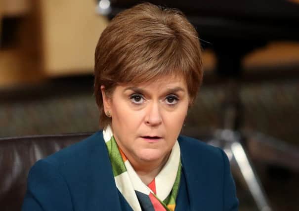 First Minister Nicola Sturgeon in the main chamber of the Scottish Parliament, Edinburgh. Picture: Jane Barlow/PA Wire