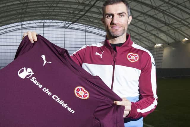 New Hearts signing Aaron Hughes is in line to make his debut in the Scottish Cup tie against Raith Rovers. Picture: SNS