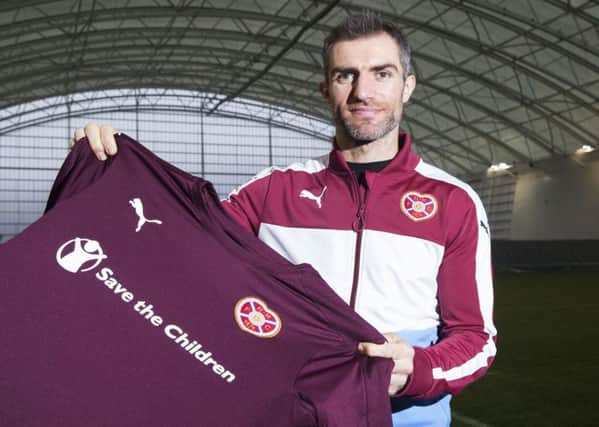 New Hearts signing Aaron Hughes is in line to make his debut in the Scottish Cup tie against Raith Rovers. Picture: SNS