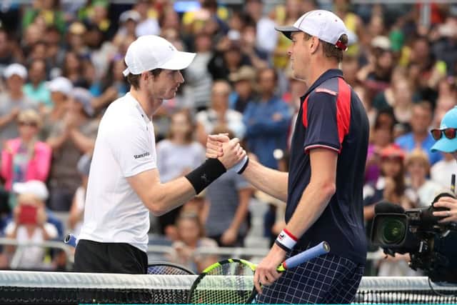 Andy Murray is congratulated by defeated opponent Sam Querrey after winning their third-round match at Melbourne Park. Picture: Scott Barbour/Getty Images