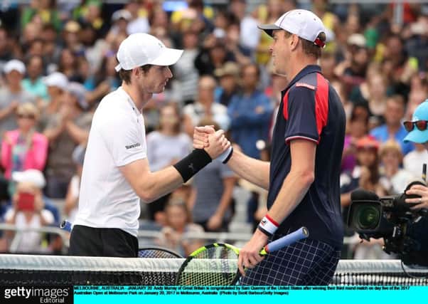 Andy Murray is congratulated by defeated opponent Sam Querrey after winning their third-round match at Melbourne Park. Picture: Scott Barbour/Getty Images