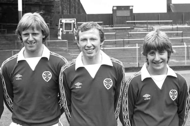 Willie Gibson, pictured at Tynecastle in July 1981, between Jim Jefferies and John Robertson. Picture: Jack Crombie