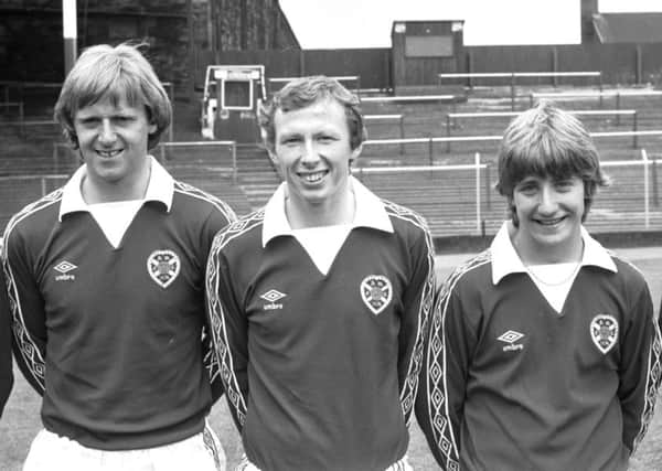 Willie Gibson, pictured at Tynecastle in July 1981, between Jim Jefferies and John Robertson. Picture: Jack Crombie