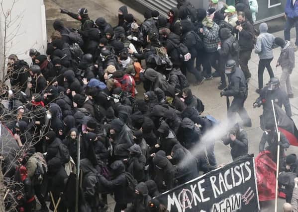 Police use pepper spray on protesters in Washington. Picture: AP
