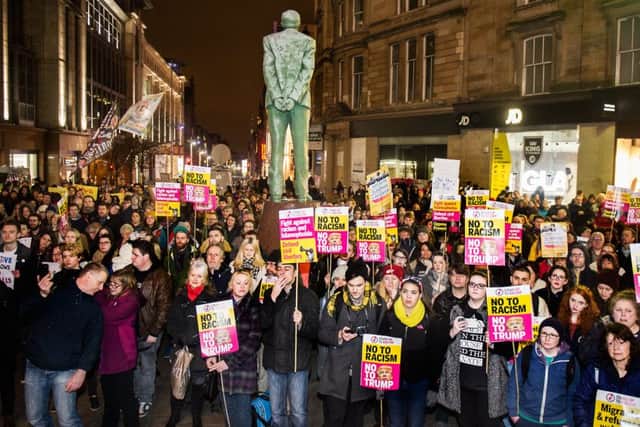 Hundreds of Glaswegians turn out at a rally protesting Donald Trump's inauguration. Picture: TSPL