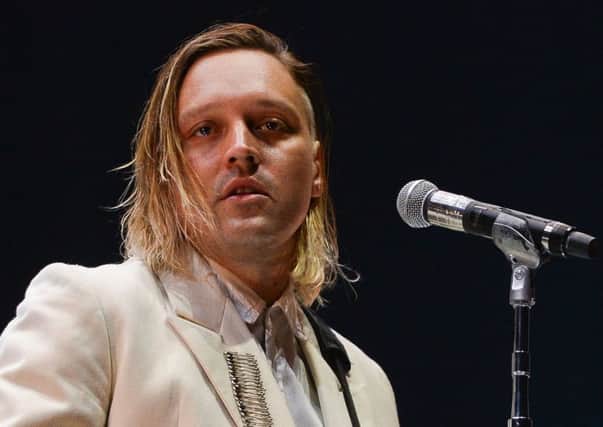 Win Butler, lead singer of Arcade Fire, Trump protesters. Picture: Getty