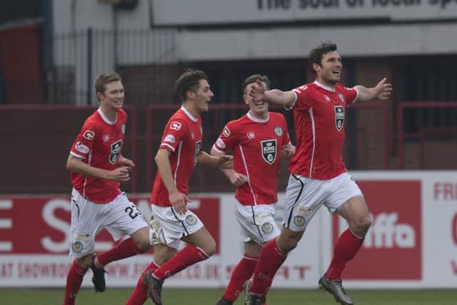 John Sutton opened the scoring against his former club in the Buddies 2-0 win. Picture: SNS/Kenny Smith