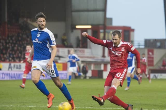 Niall McGinn scores his second in Aberdeen's comfortable win. Picture: SNS/Craig Foy