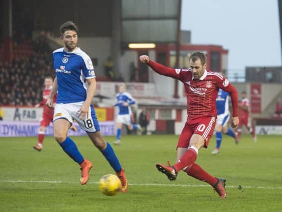 Niall McGinn scores his second in Aberdeen's comfortable win. Picture: SNS/Craig Foy