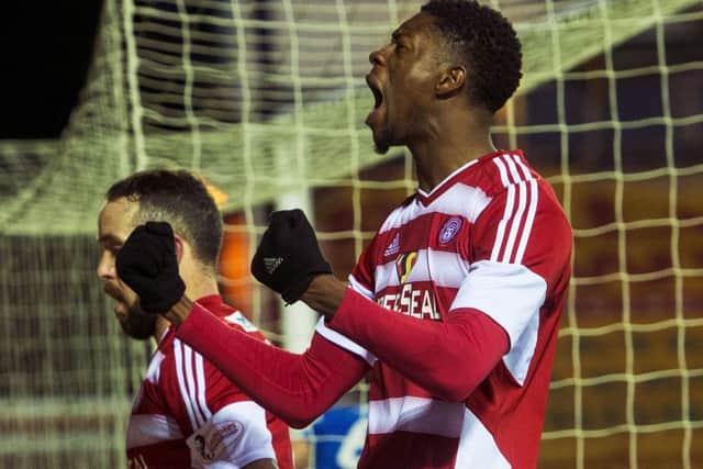 Rakish Bingham celebrates his goal