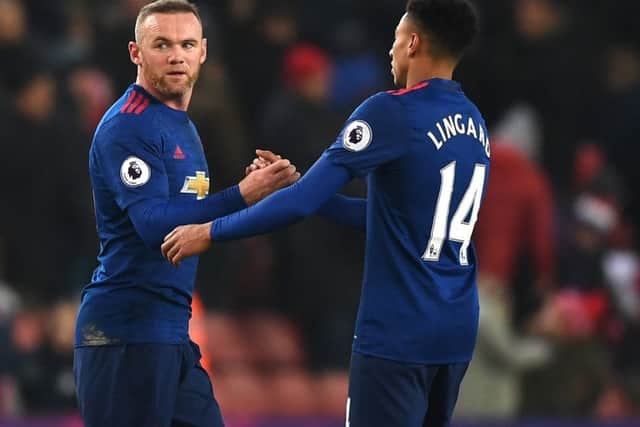 Wayne Rooney celebrates with Jesse Lingard. Pic: Gareth Copley/Getty Images