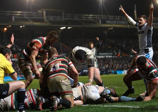 Glasgow's Henry Pyrgos, right, celebrates as Tim Swinson goes over for the Warriors' sixth try against Leicester Tigers. Picture: Stu Forster/Getty Images