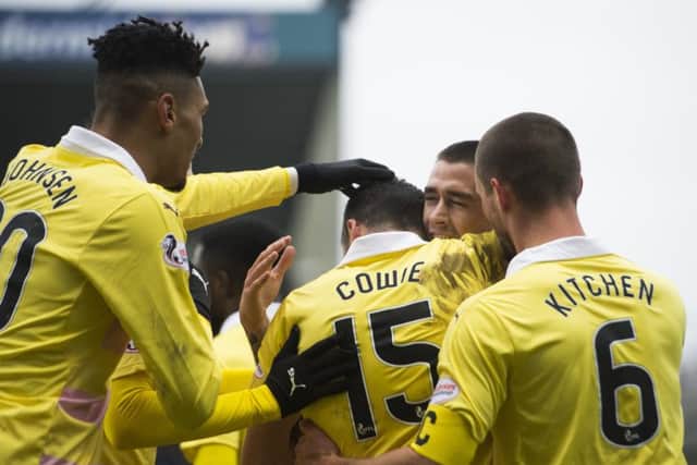 Jamie Walker celebrates with team-mates after putting Hearts ahead at Stark's Park. Picture: SNS