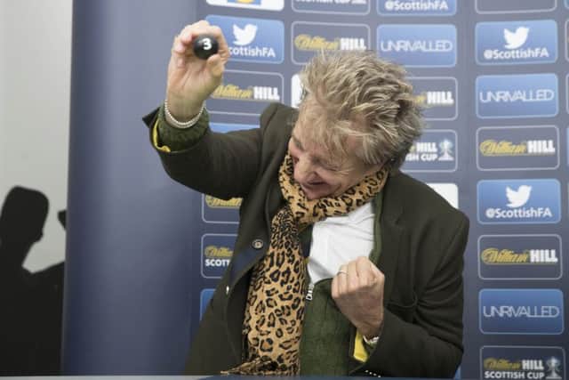 Sir Rod Stewart cheers after pulling out Celtic for a home tie in the fifth round of the Scottish Cup. Picture: PA