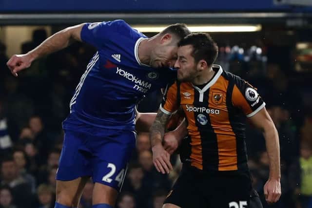 Gary Cahill and Ryan Mason clash heads. Pic: Getty Images