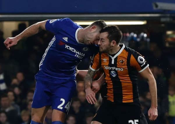 Gary Cahill and Ryan Mason clash heads. Pic: Getty Images