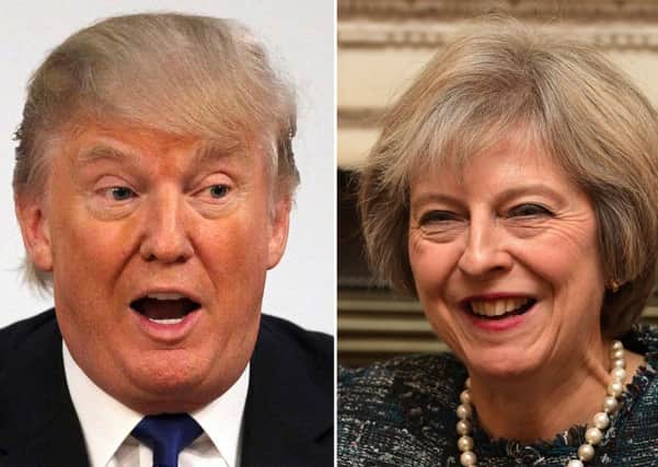 Donald Trump and Theresa May, who will hold talks this week on slashing tariffs on existing trade between Britain and the United States. Picture: PA Wire
