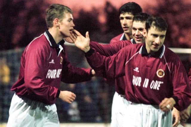 Kenny Miller is congratulated by Crawford Baptie, Martin Christie and Adrian Sprott after his second goal.