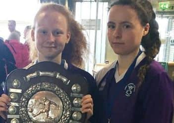 Georgia, holding the shield, and Mhairi Crooks will play in the Scottish Schools team.