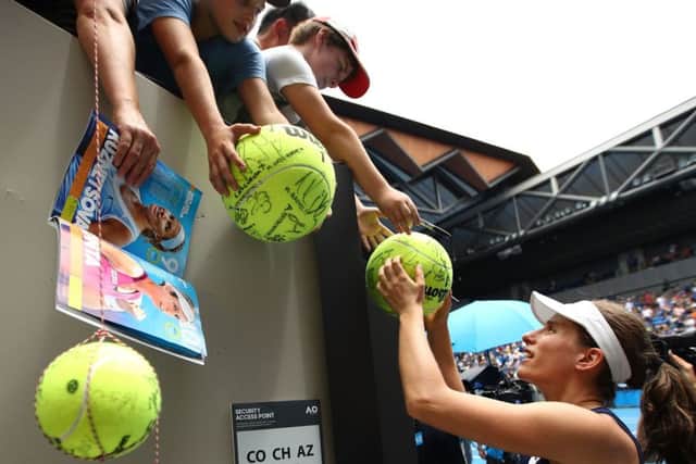 Johanna Konta signs autographs for young fans after winning her fourth-round match against Ekaterina Makarova at the Australian open. Picture: Clive Brunskill/Getty Images