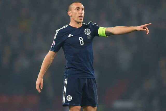 Scott Brown has yet to make his decision on whether to continue playing for Scotland. Picture: SNS