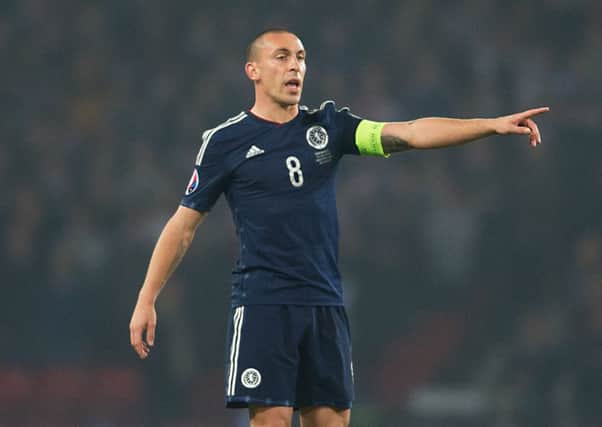 Scott Brown has yet to make his decision on whether to continue playing for Scotland. Picture: SNS