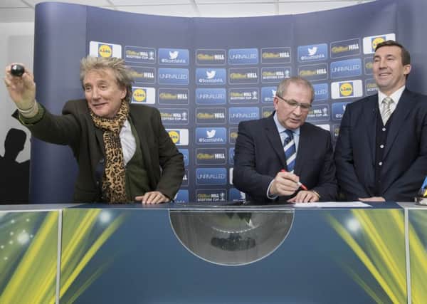 Sir Rod Stewart (left), along with SFA President Alan McRae (centre) and Alan Stubbs during the William Hill Scottish Cup fifth round draw. Picture: PA