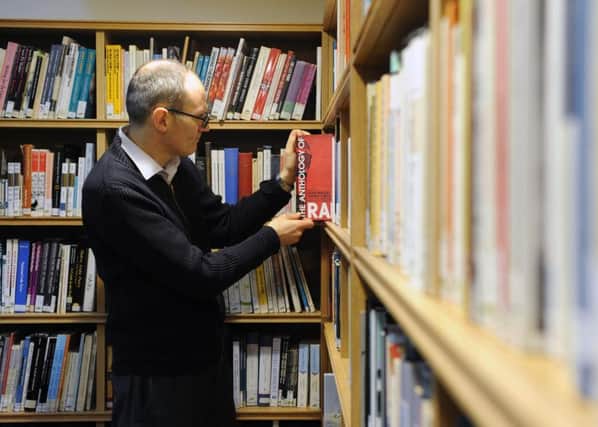 Book ownership is falling as the number of people owning smart devices, such as tablets, grows. Picture: Lisa Ferguson