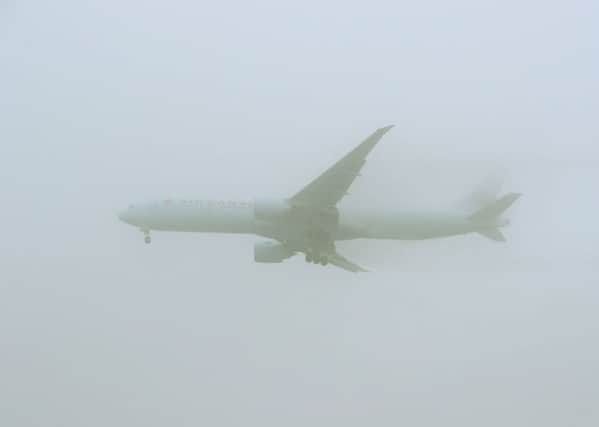 Several flights have been grounded due to fog. Picture; Steve Parsons/PA Wire
