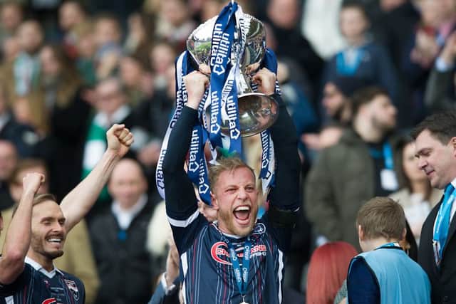 Andrew Davies captained Ross County to League Cup glory last year. Picture: John Devlin