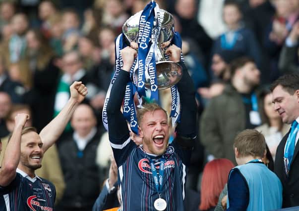 Andrew Davies captained Ross County to League Cup glory last year. Picture: John Devlin