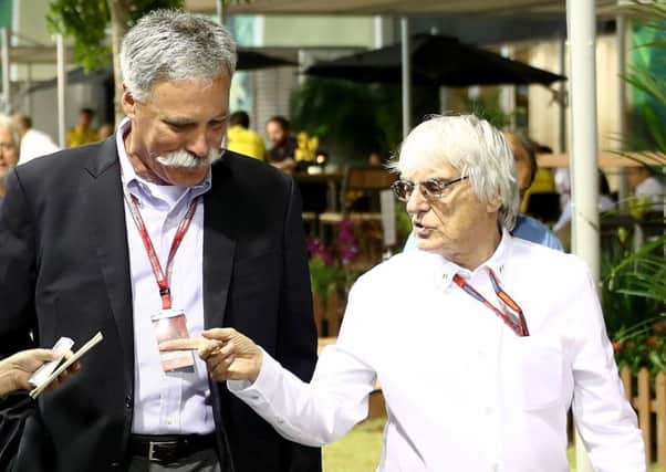 Chase Carey, left, and Bernie Ecclestone in the paddock during the Singapore Grand Prix weekend in September. Picture: Lars Baron/Getty Images