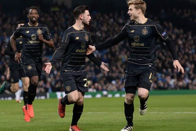 Celtic winger Patrick Roberts, centre, celebrates with Stuart Armstrong after scoring against his parent club Manchester City in the Champions League. Picture: AFP/Getty