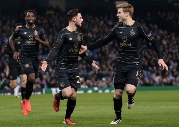 Celtic winger Patrick Roberts, centre, celebrates with Stuart Armstrong after scoring against his parent club Manchester City in the Champions League. Picture: AFP/Getty