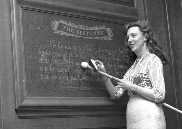 The gold leaf plaque bearing the pledge from The Scotsmans Prospectus is refurbished at North Bridge, 1965. Picture: TSPL