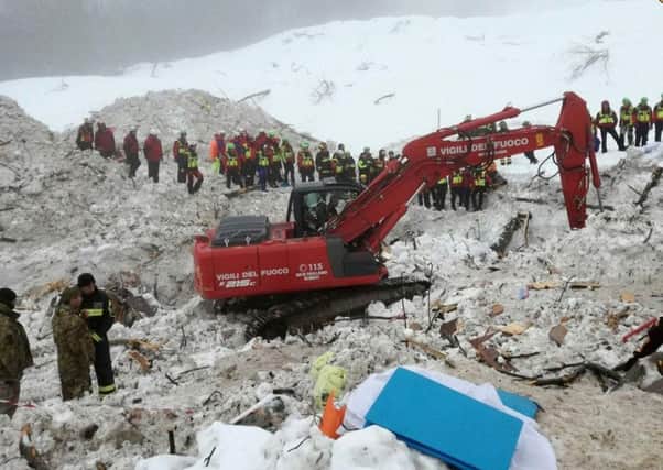 Italian Mountain Rescue Service continues excavation work at the site of the avalanche-buried Hotel Rigopiano. Picture: AP