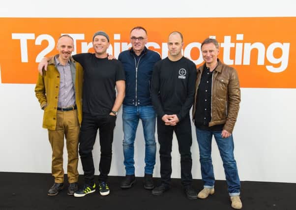 Director Danny Boyle (centre) with T2 cast members Ewen Bremner, Ewan McGregor, Jonny Lee Miller and Robert Carlyle. Picture: PA