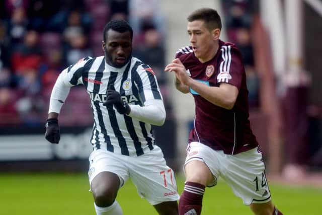 Esmael Goncalves, with Jamie Walker, during a league game in 2013. Picture: Phil Wilkinson
