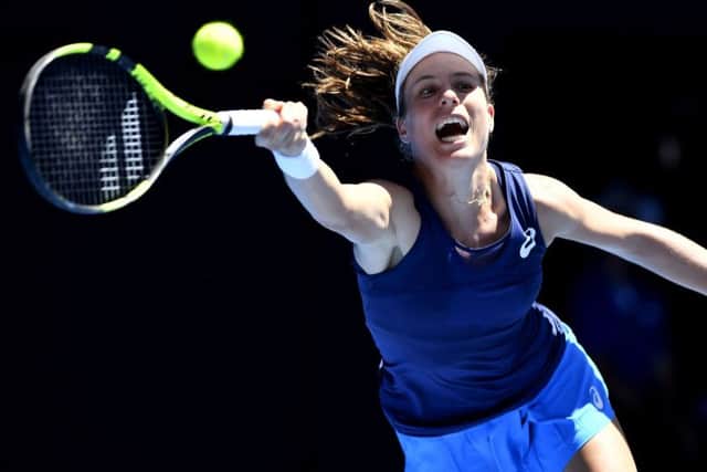Johanna Konta makes a forehand return to Serena Williams during the Australian Open quarter-final. Picture: Andy Brownbill/AP