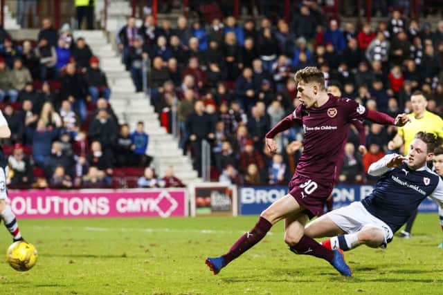 Rory Currie, making his full debut, equalises for Hearts in the 35th minute at Tynecastle.