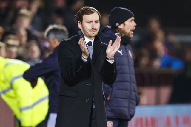 Hearts head coach Ian Cathro applauds his players after the cup replay win over Raith Rovers. Picture: Roddy Scott/SNS