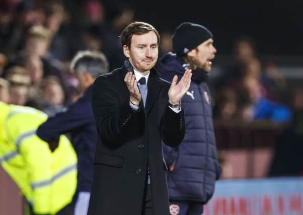Hearts head coach Ian Cathro applauds his players after the cup replay win over Raith Rovers. Picture: Roddy Scott/SNS