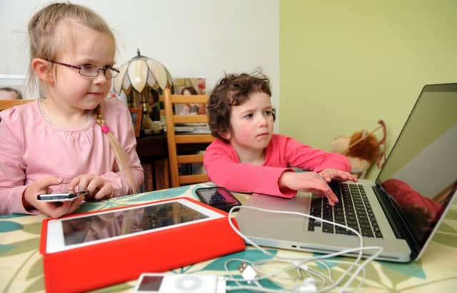 Children are often more interested in the delights of  technology Picture:  Jane Barlow